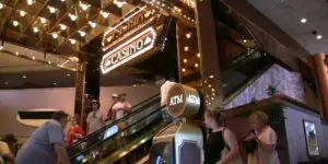 ATM machine sign in front of a casino